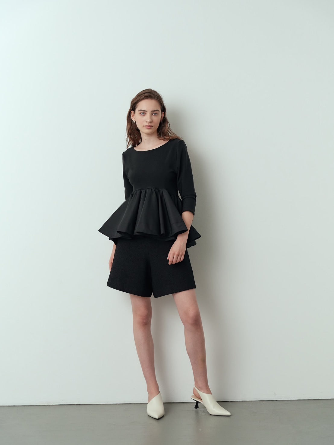 Back-conscious peplum top Charlotte